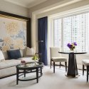 Premier-Deluxe-Guestroom-Living-Area_The-Peninsula-Chicago